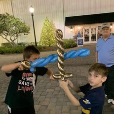 2 boys sword fight.jpg