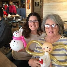 2 older women snowman and angel.jpg