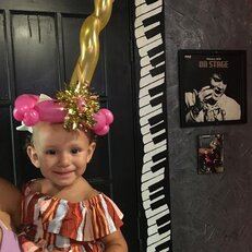 adorable little girl with unicorn hat.jpg